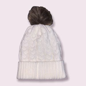 white beanie with designs